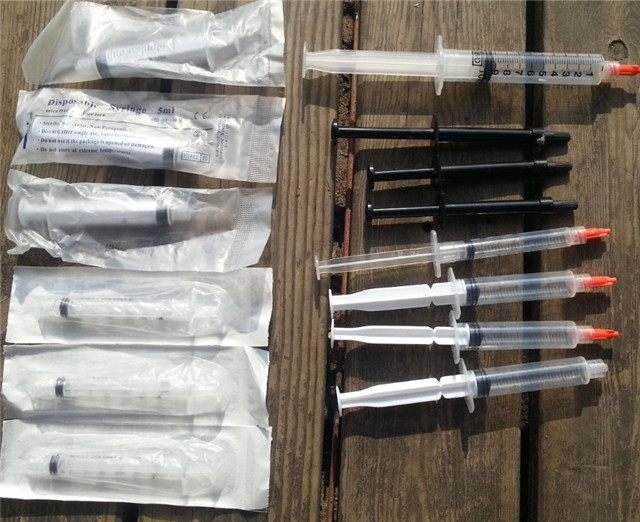Australian customers sent us samples for testing YX-SL25 tabletop syringe / vial / small round product labeler