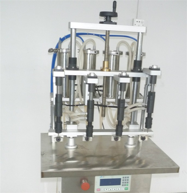 top part of 4 heads Semi-automatic Filling Machine for Perfu