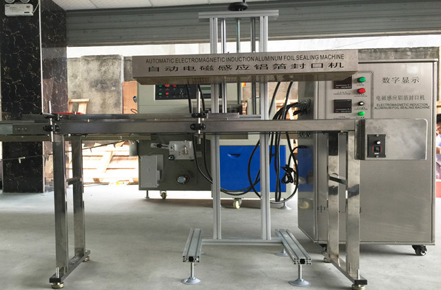 full view of YX-IS1800 induction sealing machine automatic m
