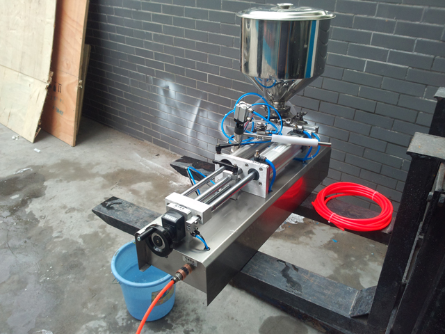 pneumatic filling machine with handheld nozzles.jpg