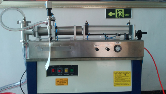 Malawian customer purchased YX-SF1-1000 semi automatic liquid juice filling machines