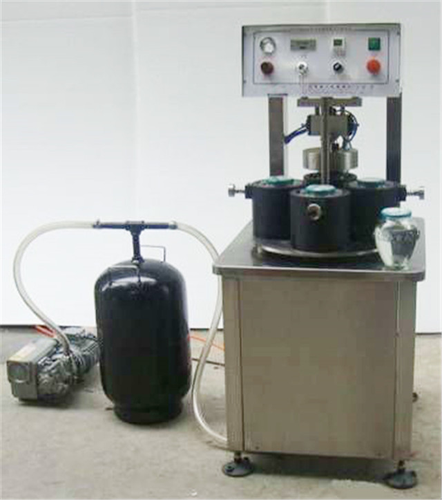 US customer ordered 4 heads semi-automated glass jar vacuum capping machine