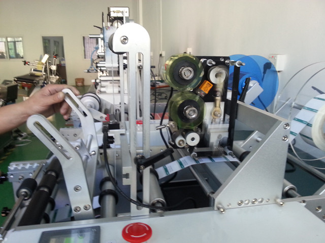operation of the benchtop Syringe labeling machine semi auto