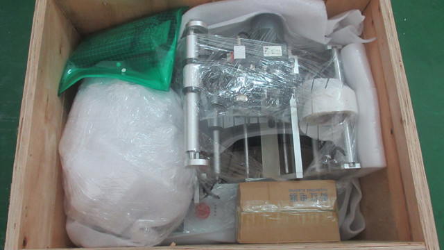 packing of the Syringe labeling machine semi automatic round