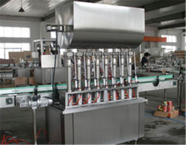 back view of 4 heads automatic honey filling machines.jpg