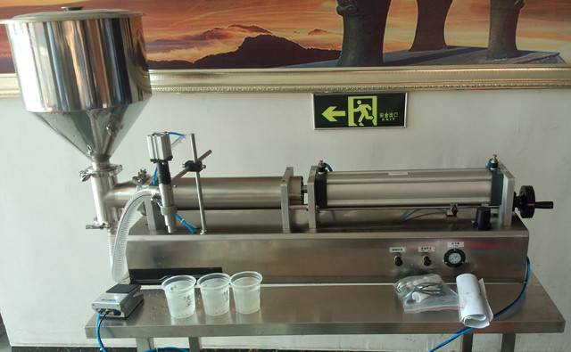Omani customer Hilal purchased YX-LC02 horizontal pneumatic filling machine&manual liquid filler for tube cream filling