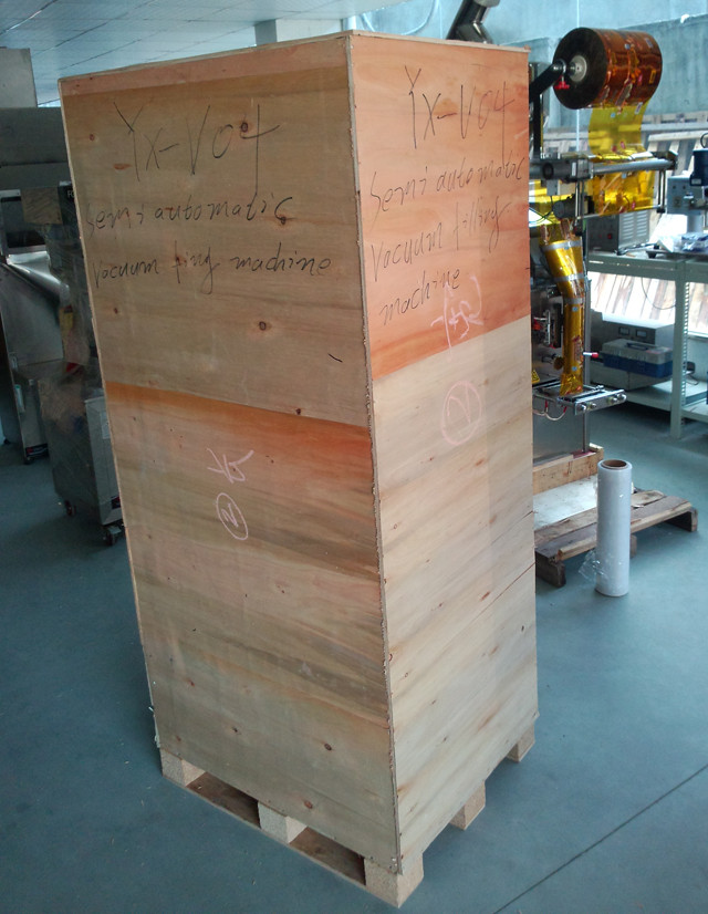 wooden case packaging of YX-V04 vacuum liquid filling machin