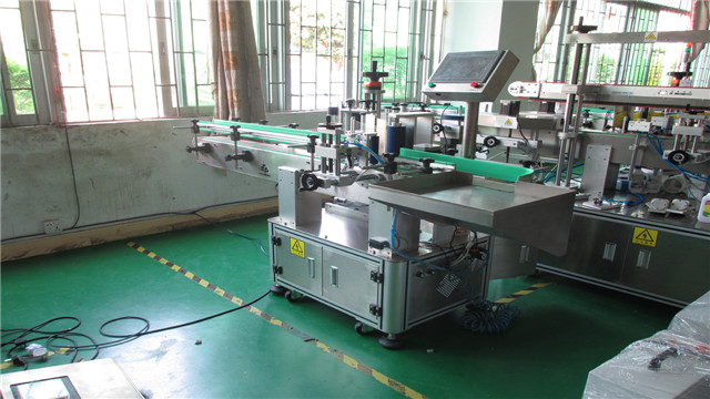 full view of Round metal cans labeling machines  at workshop