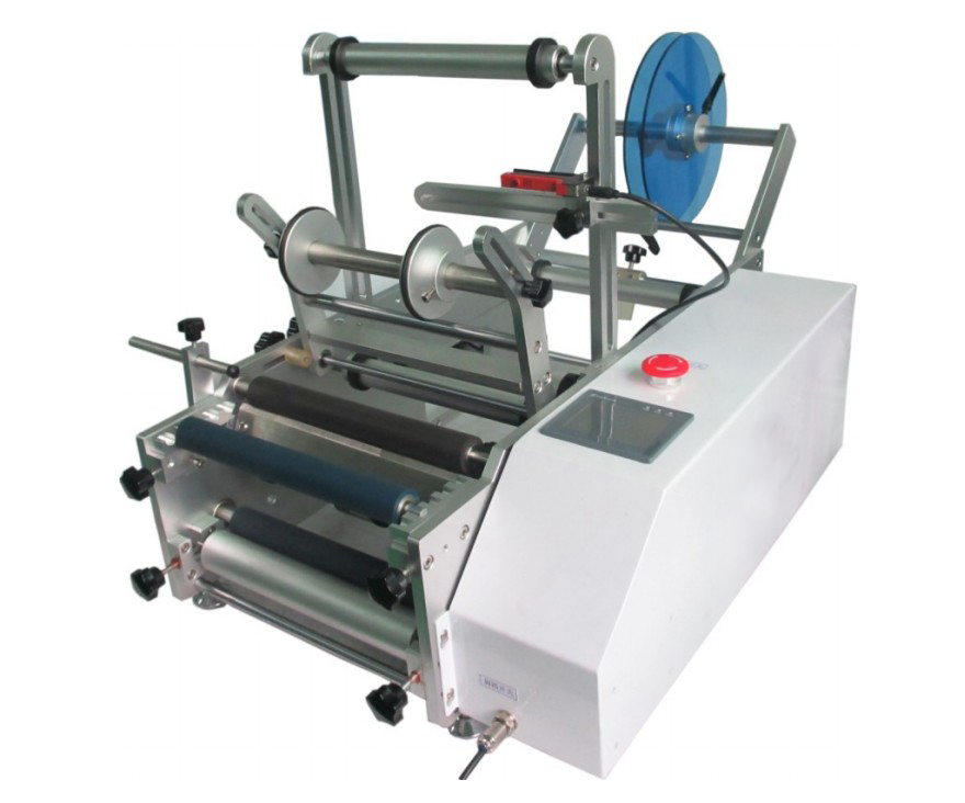 close up photo of red wine bottles labeling machine.jpg