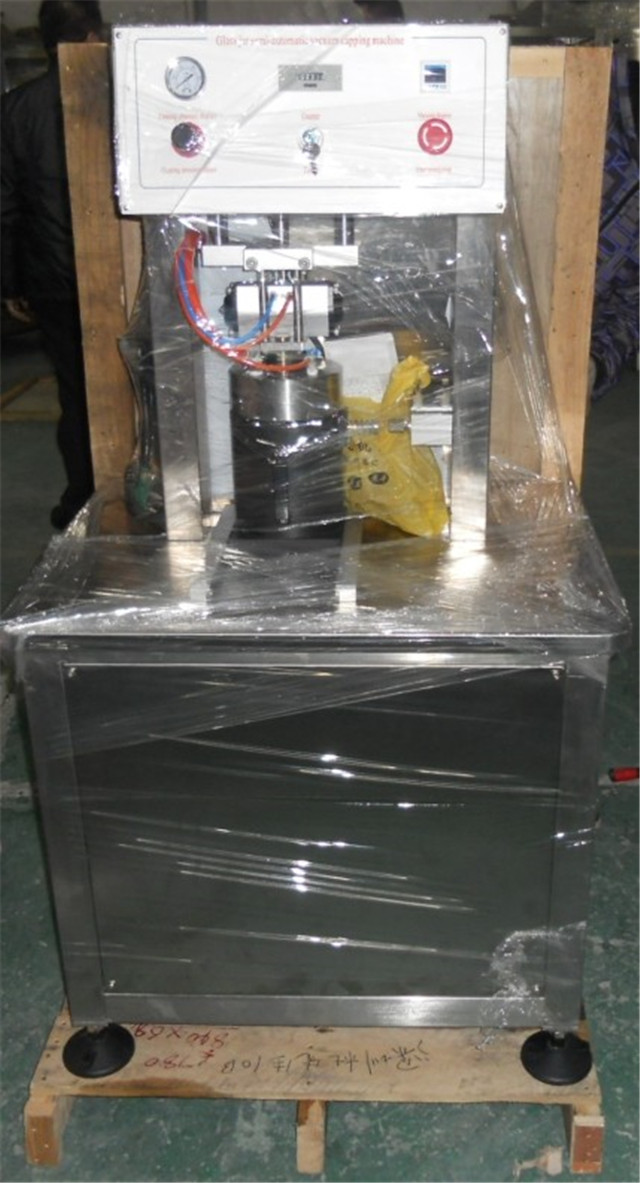 overview of semi automatic vacuum capping machine.jpg