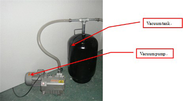 vacuum pump and tank.jpg