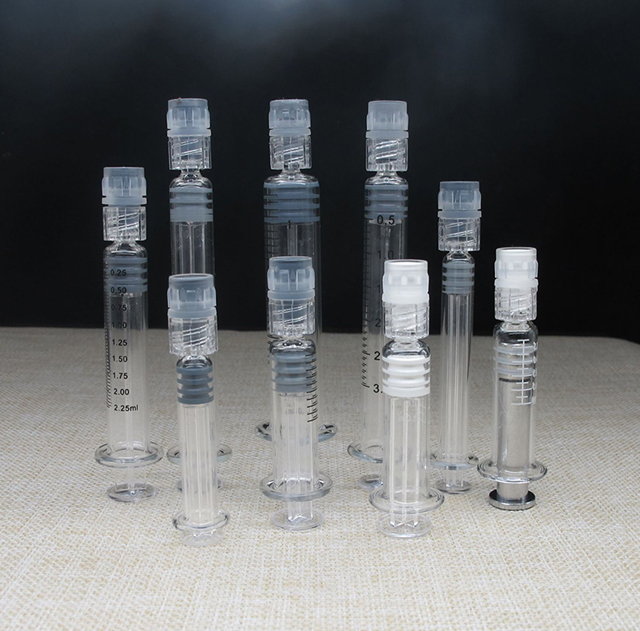 glass syringes for vacuum filler plugging machine.jpg